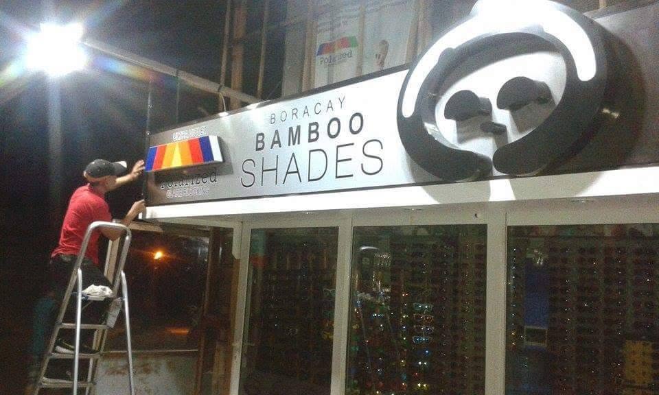 Bamboo Shades signage installation in progress