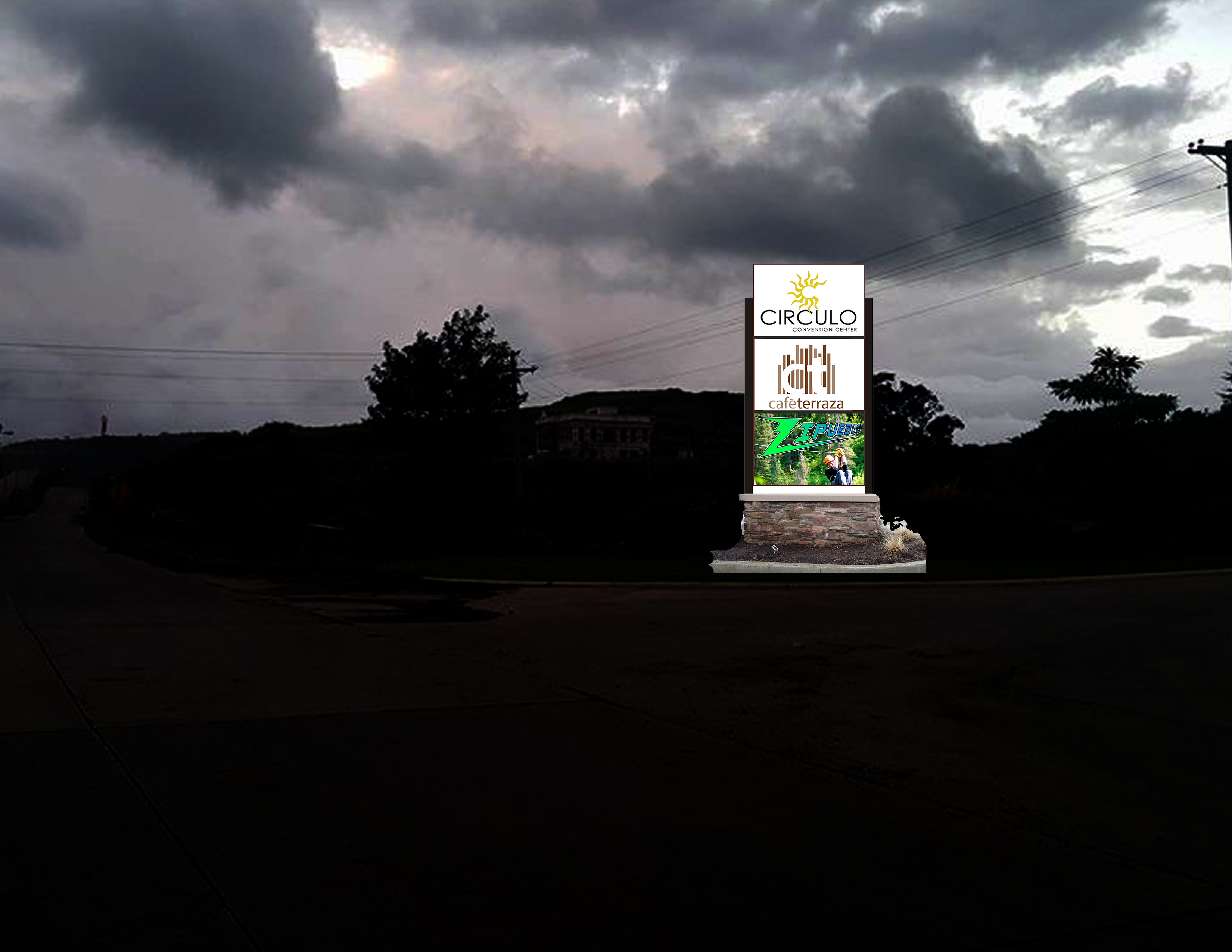 Illuminated pylon signage at night